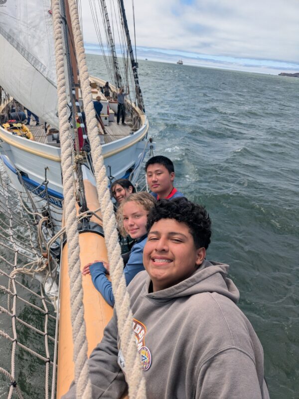 Students on the bowsprit